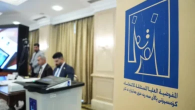 Iraq’s electoral commission warns of candidate disqualification over voter card violations