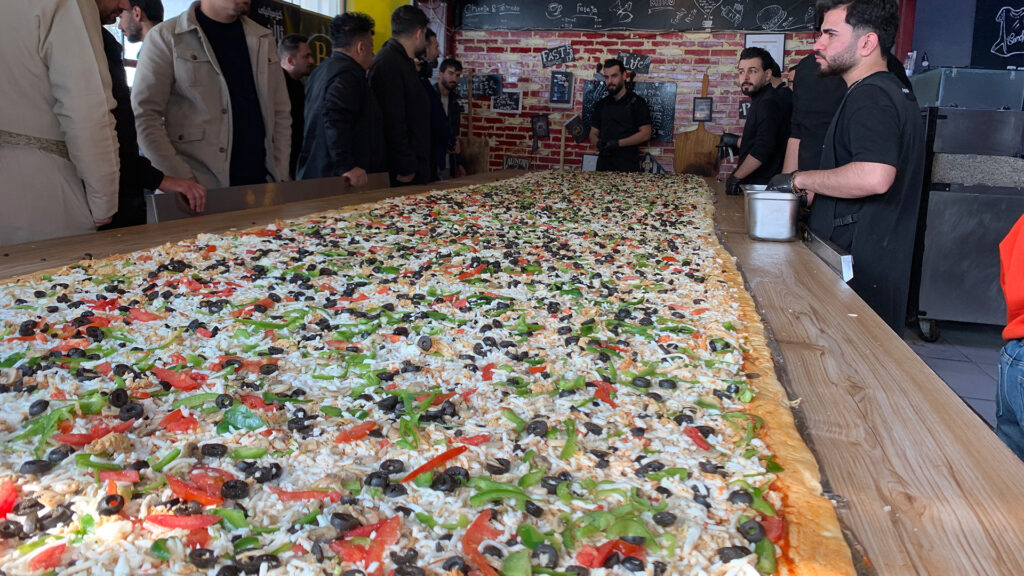 Young man from Sulaymaniyah's Hajiawa district aims to set record for Iraq’s largest pizza